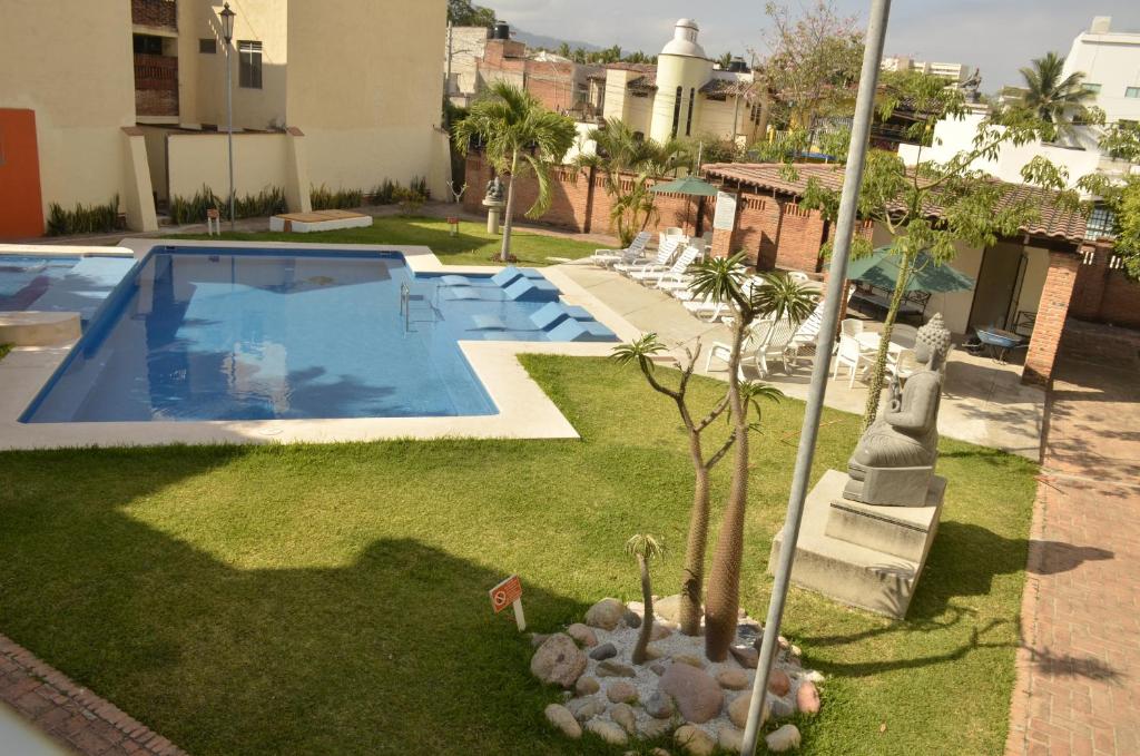 Bazén v ubytování Zenharmony Suites nebo v jeho okolí