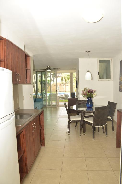 Kuchyň nebo kuchyňský kout v ubytování Zenharmony Suites