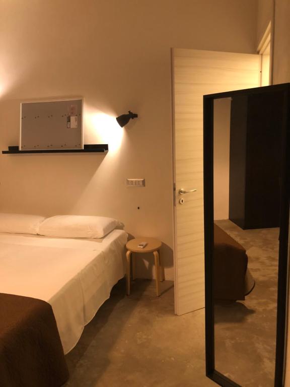 Posteľ alebo postele v izbe v ubytovaní B&B La Via di Casa