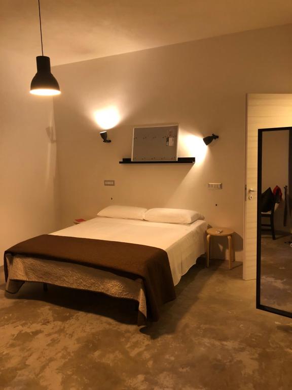 Posteľ alebo postele v izbe v ubytovaní B&B La Via di Casa