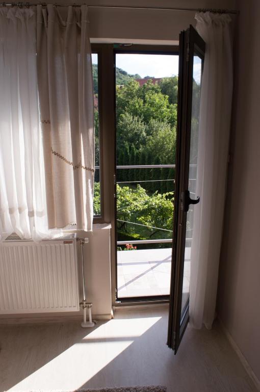 Posteľ alebo postele v izbe v ubytovaní Guest House Dimitrije