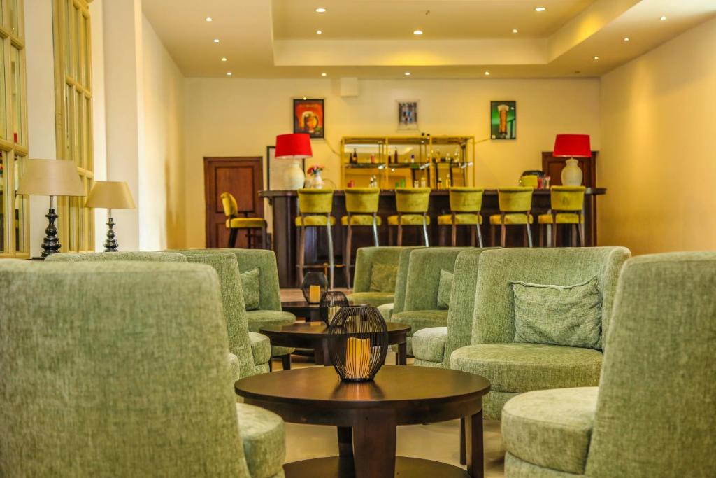 Posezení v ubytování Oak Ray Regency