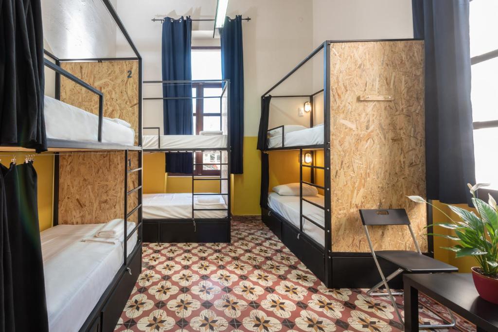 Postel nebo postele na pokoji v ubytování Intra Muros Hostel