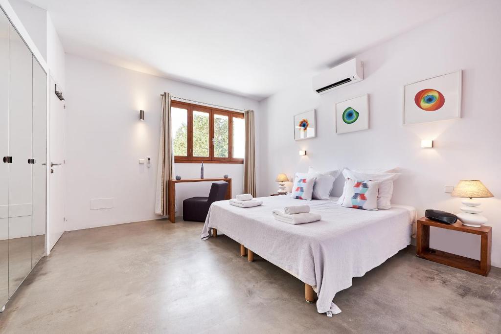 Postel nebo postele na pokoji v ubytování Villa Can Kiva