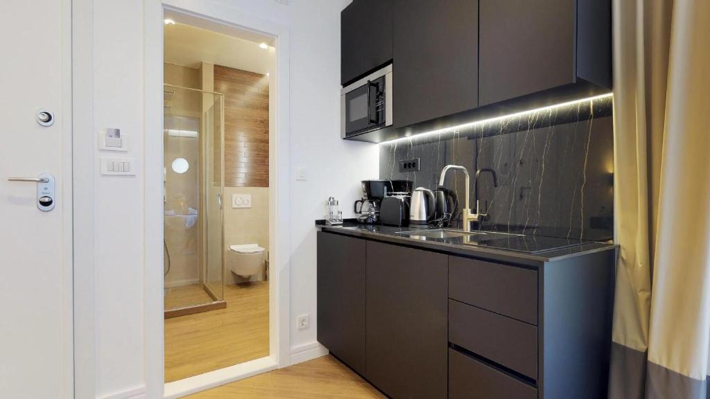 Kuchyňa alebo kuchynka v ubytovaní Illyria Luxury Studio Apartments
