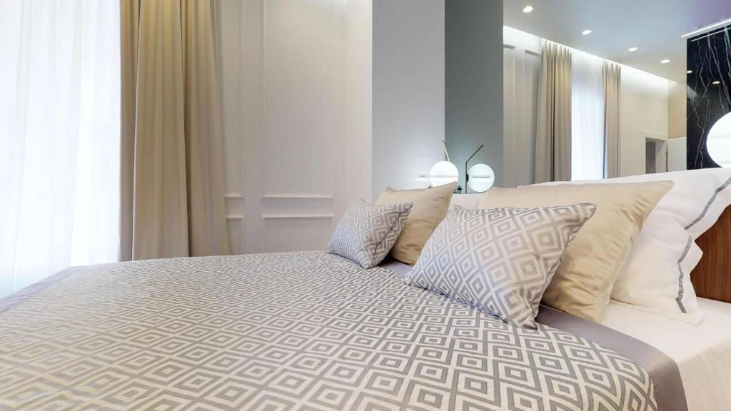 Posteľ alebo postele v izbe v ubytovaní Illyria Luxury Studio Apartments