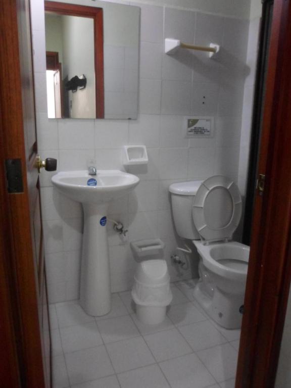 Koupelna v ubytování Hotel Cafetto