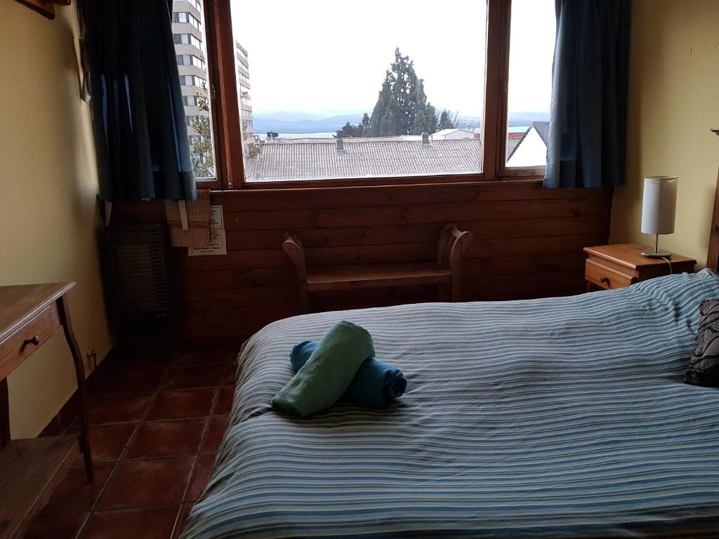Postel nebo postele na pokoji v ubytování Patagonia Jazz Hostel