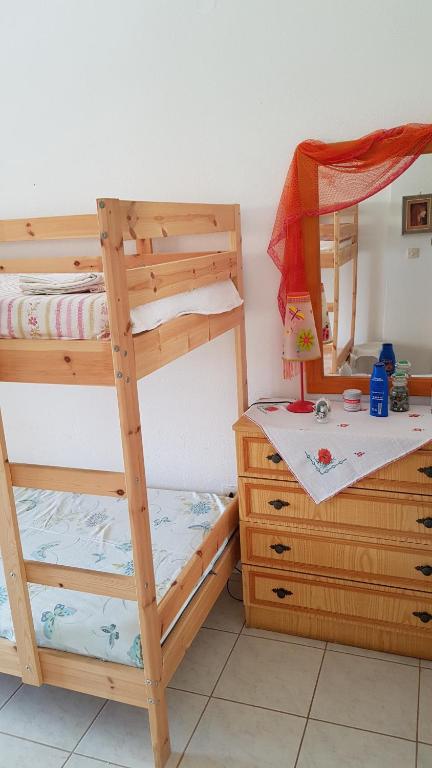 Posteľ alebo postele v izbe v ubytovaní Cosy family apartment near the Sea