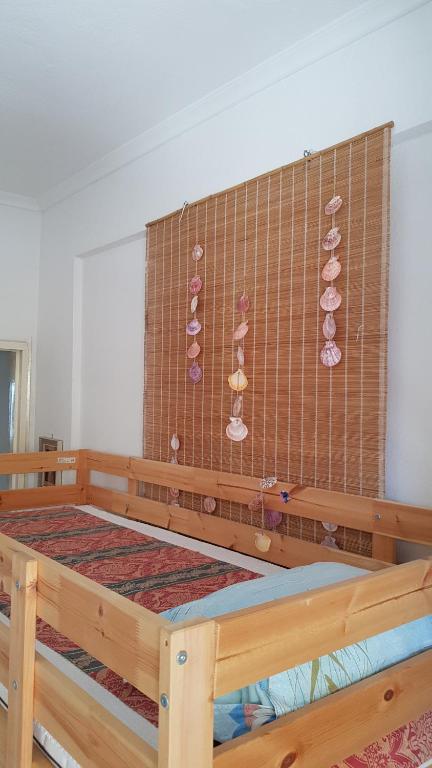 Posteľ alebo postele v izbe v ubytovaní Cosy family apartment near the Sea
