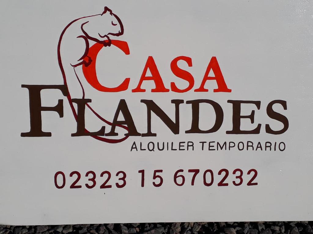 盧漢的住宿－Casa Flandes - Jáuregui - Luján - Buenos Aires，纪念女农场主的标志
