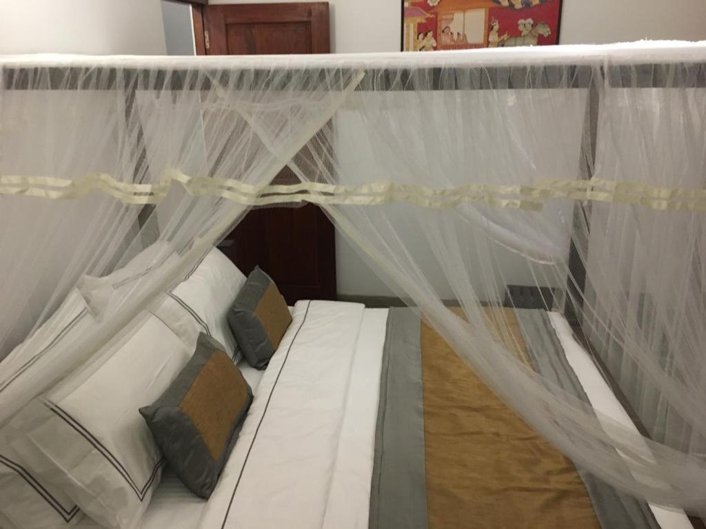 Postel nebo postele na pokoji v ubytování Dumbara Peak Residence