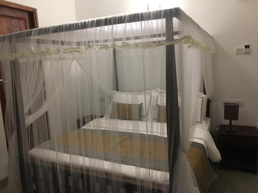 Postel nebo postele na pokoji v ubytování Dumbara Peak Residence