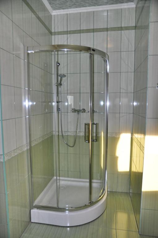 Koupelna v ubytování Focus Hotel