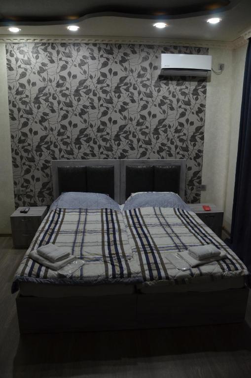 Postel nebo postele na pokoji v ubytování Guest house UTA