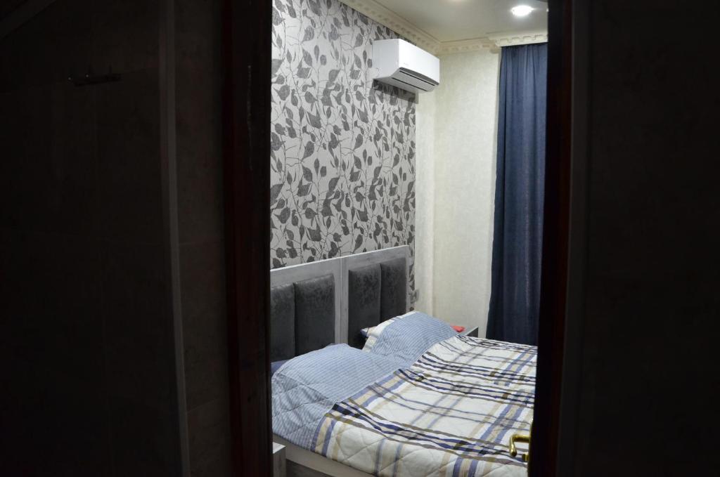 Postel nebo postele na pokoji v ubytování Guest house UTA