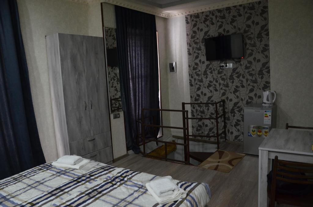 Postel nebo postele na pokoji v ubytování Guest house UTA