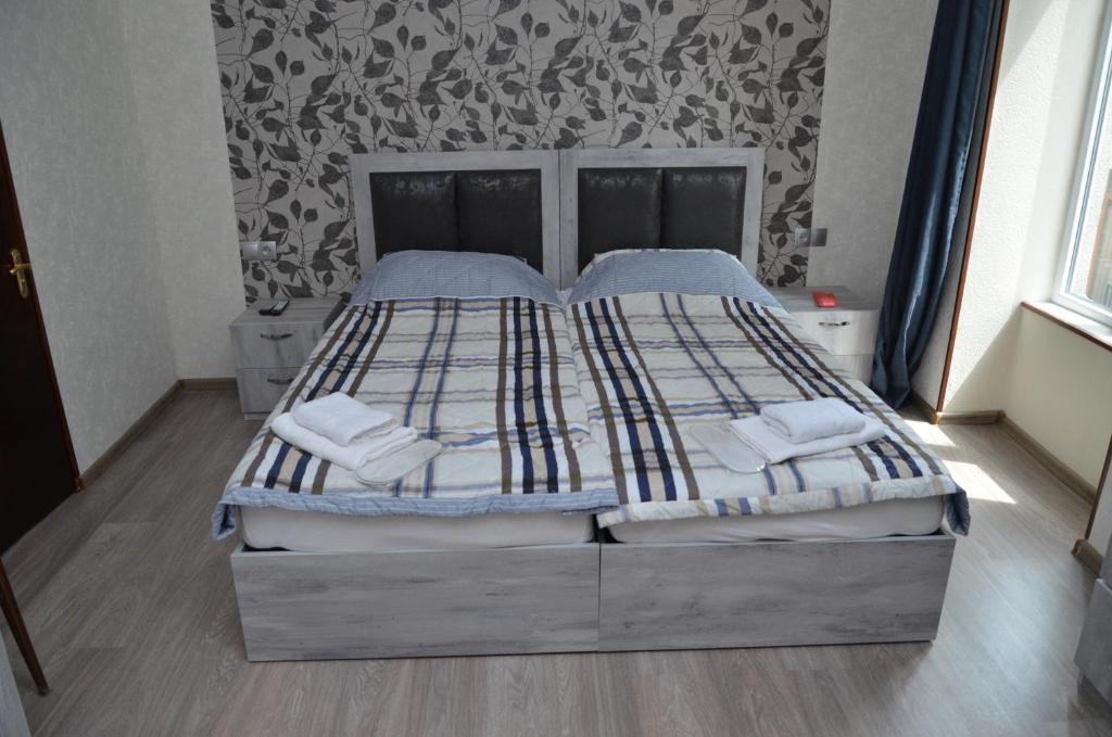 Postel nebo postele na pokoji v ubytování Guest house UTA
