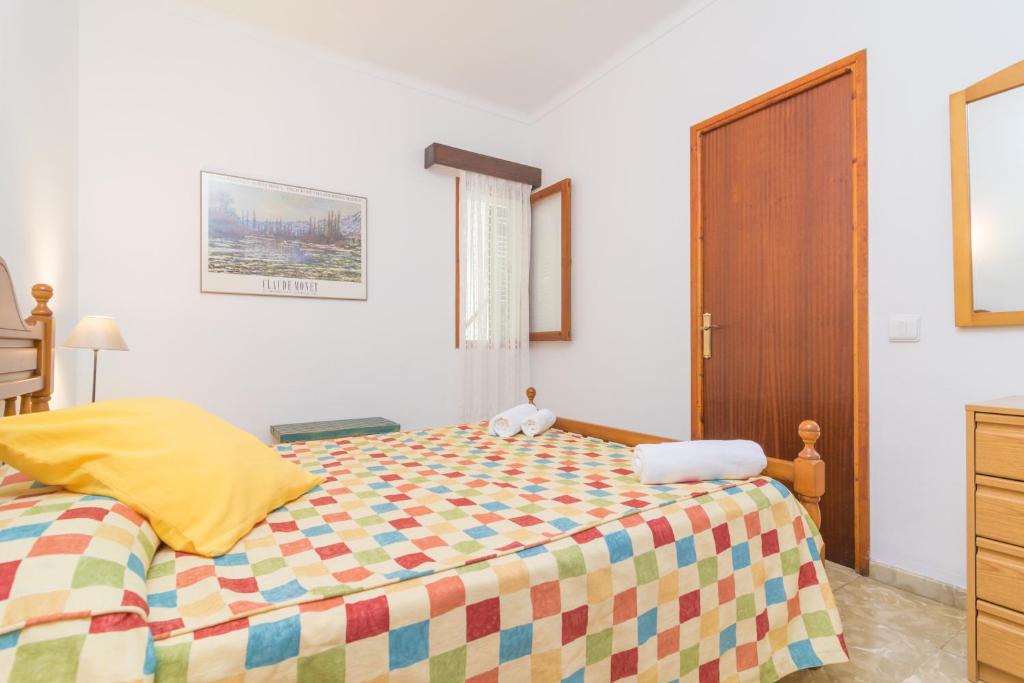 Posteľ alebo postele v izbe v ubytovaní Casa Tradicional Can Picafort