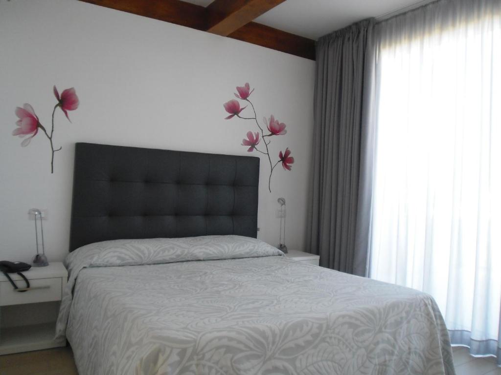 Postel nebo postele na pokoji v ubytování My Hotel