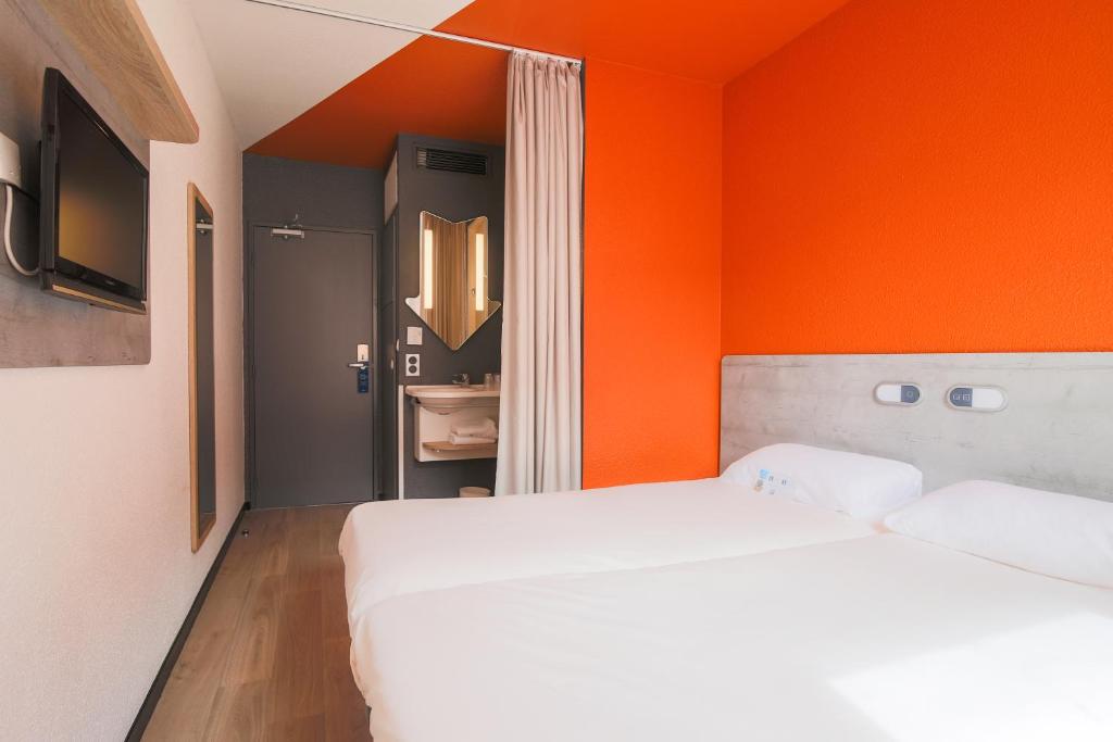 Llit o llits en una habitació de Ibis Budget Albi Centre