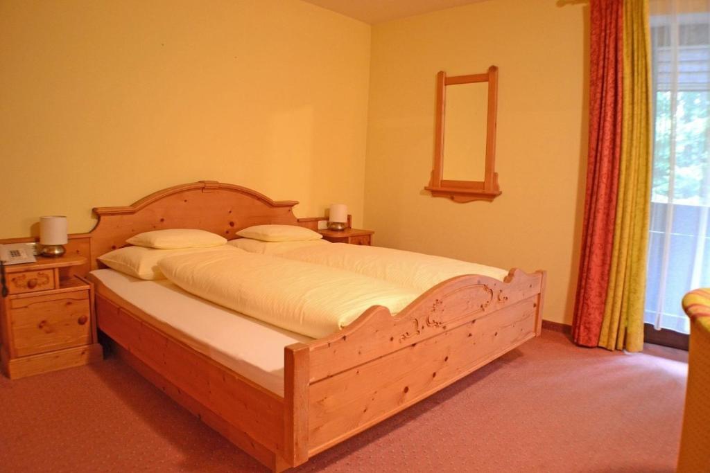 Posteľ alebo postele v izbe v ubytovaní Hotel Mooserkreuz