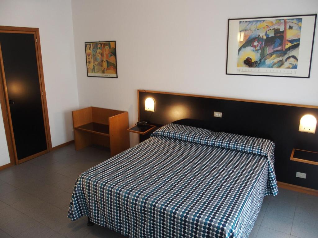 Postel nebo postele na pokoji v ubytování Hotel Eden
