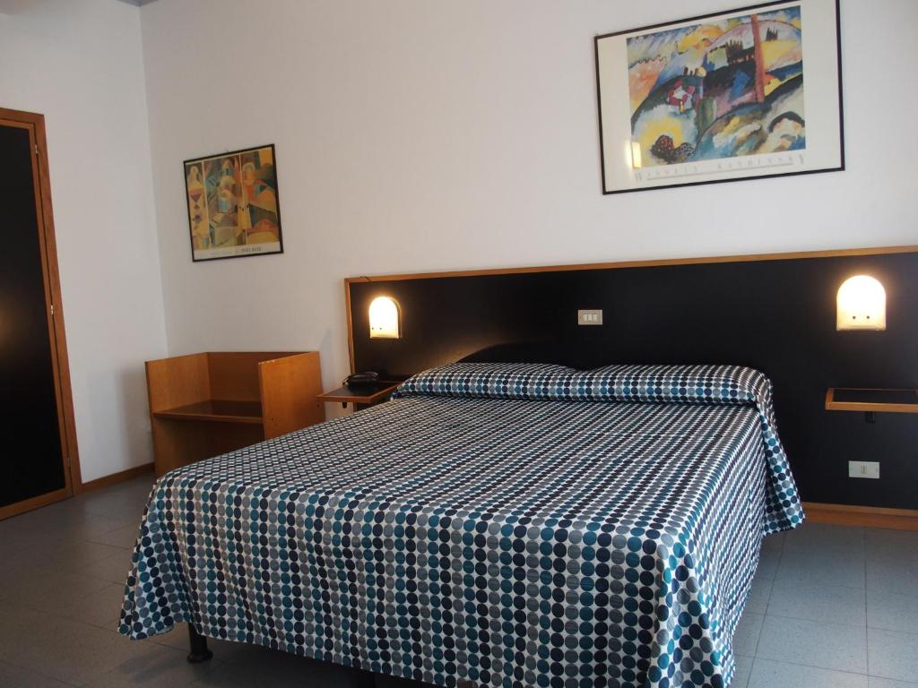 Postel nebo postele na pokoji v ubytování Hotel Eden