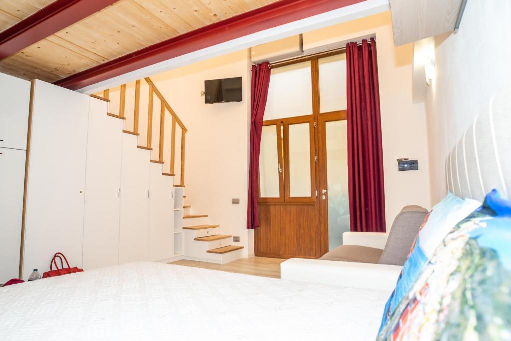 Postel nebo postele na pokoji v ubytování Eden Rooms