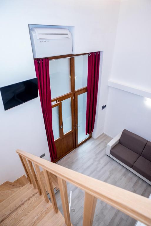 Postel nebo postele na pokoji v ubytování Eden Rooms
