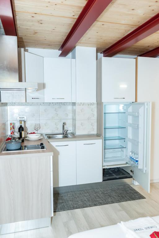 Kuchyň nebo kuchyňský kout v ubytování Eden Rooms