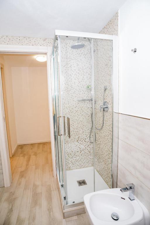 Koupelna v ubytování Eden Rooms
