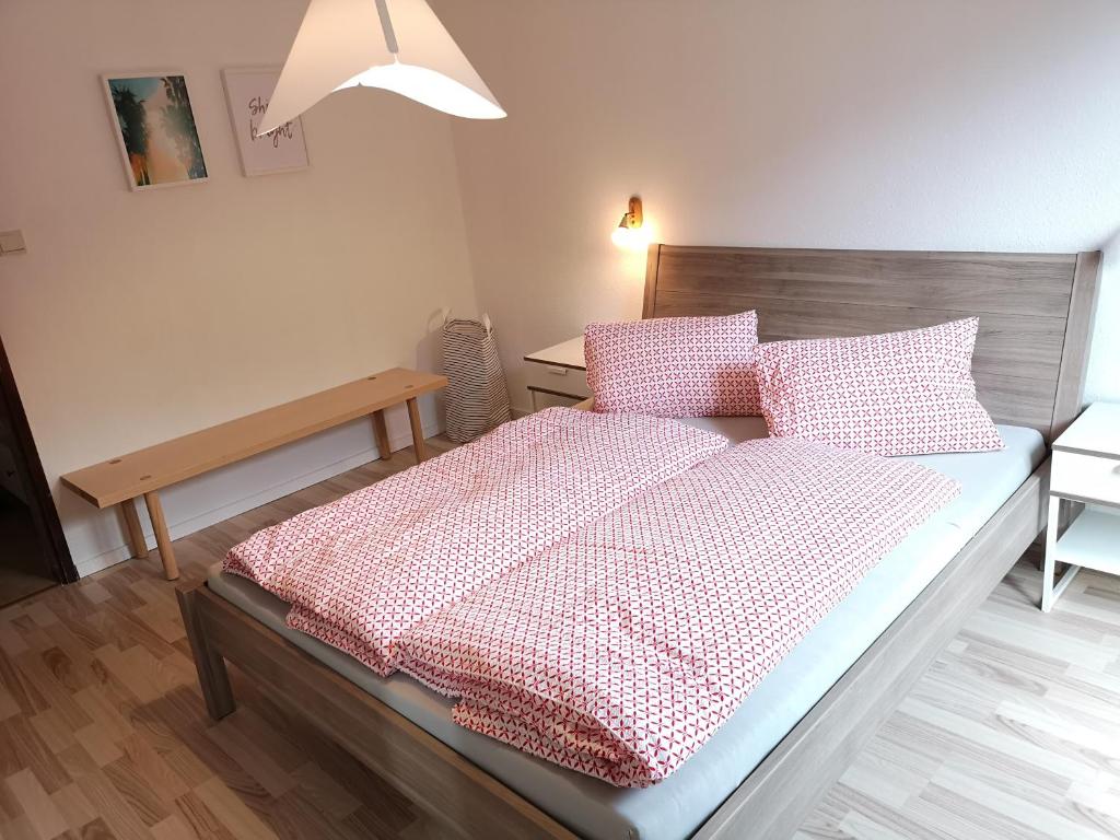 Postel nebo postele na pokoji v ubytování Appartment Scharleralm