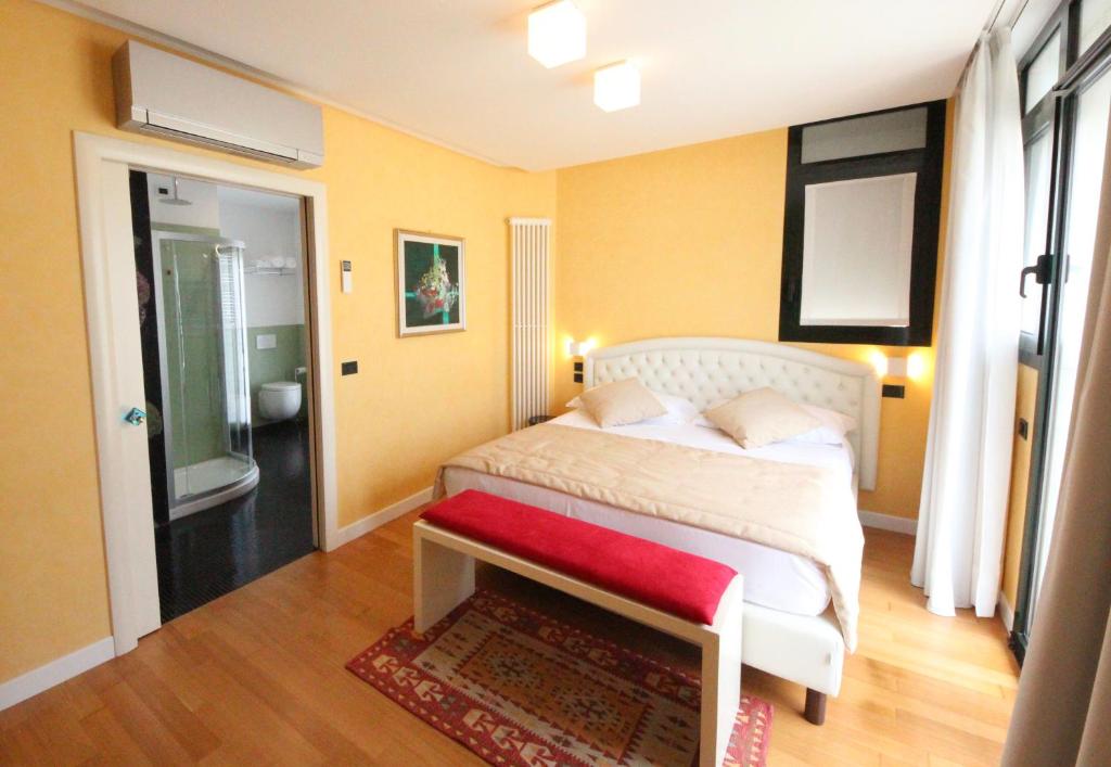 Postel nebo postele na pokoji v ubytování Ruhl Beach Hotel & Suites