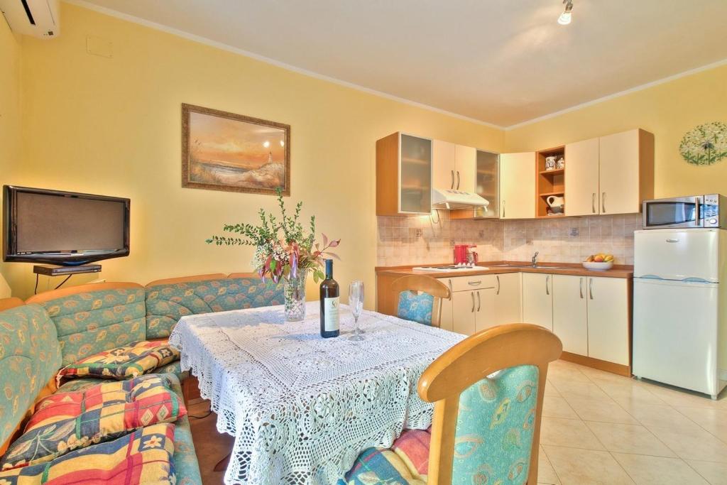 Kuchyň nebo kuchyňský kout v ubytování Lorena Apartments