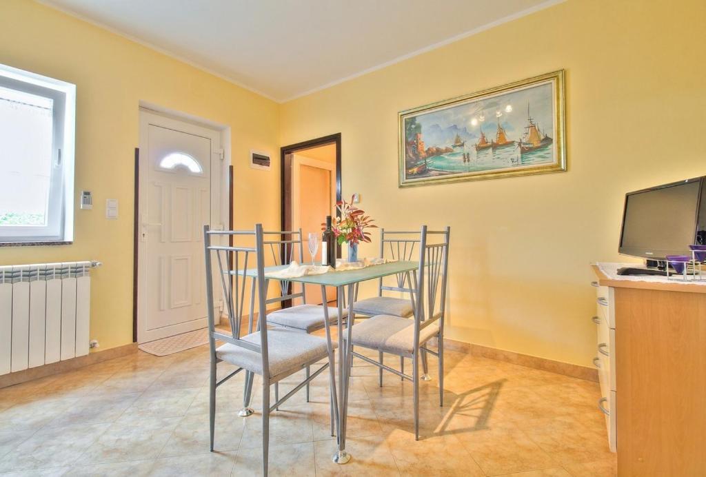 TV a/nebo společenská místnost v ubytování Lorena Apartments