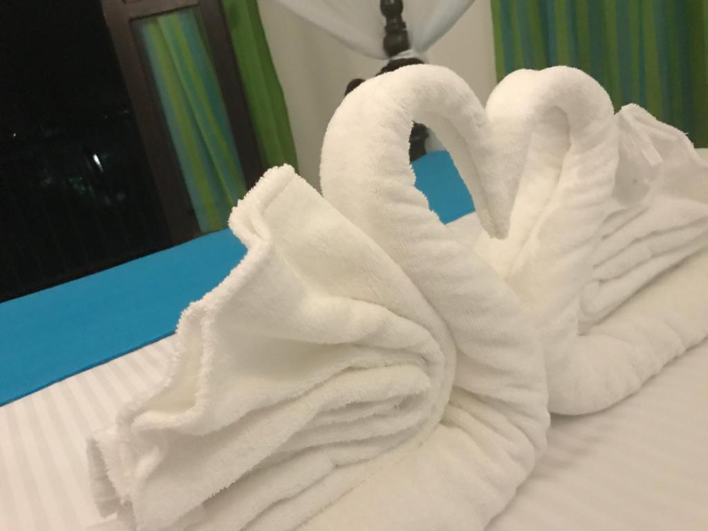 Postel nebo postele na pokoji v ubytování Aura