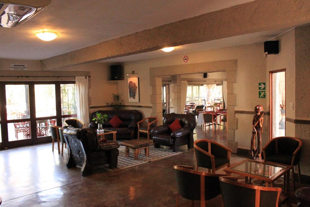 Posezení v ubytování Grand Kruger Lodge and Spa