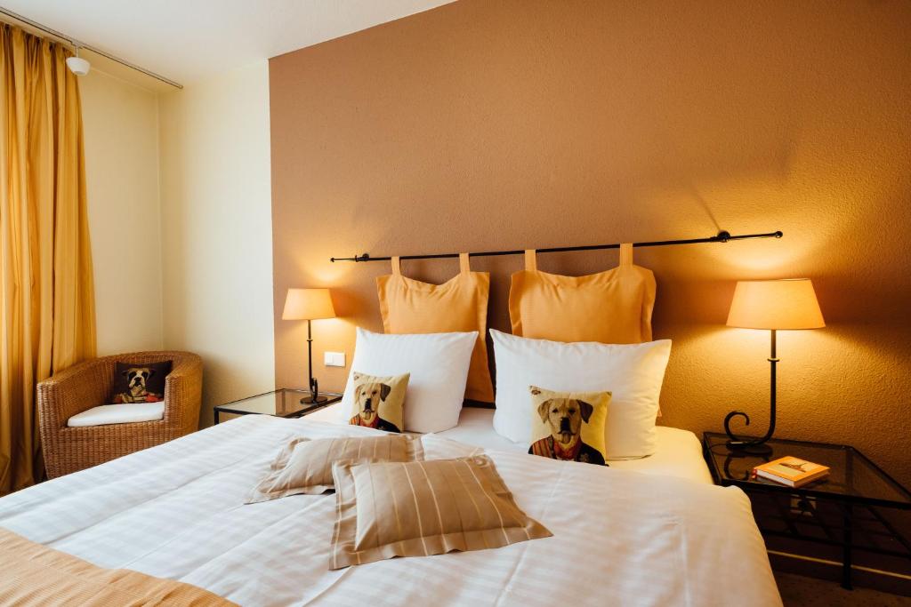 Postel nebo postele na pokoji v ubytování Hotel zur Mühle