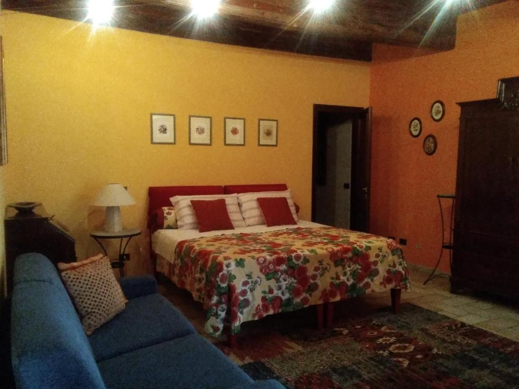 Postel nebo postele na pokoji v ubytování Cascina Baresane