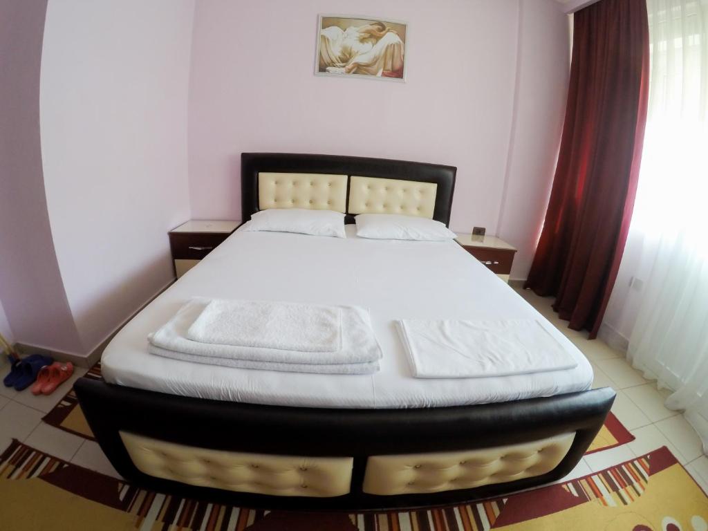 Llit o llits en una habitació de Hotel Freskia
