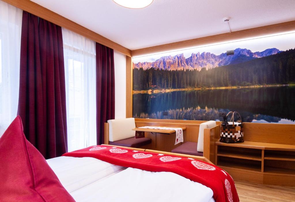 Postel nebo postele na pokoji v ubytování Hotel Cirelle Suite & Spa