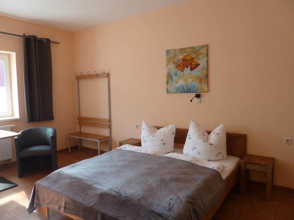 Postel nebo postele na pokoji v ubytování Hotel Wittenberg-Hotel Garni