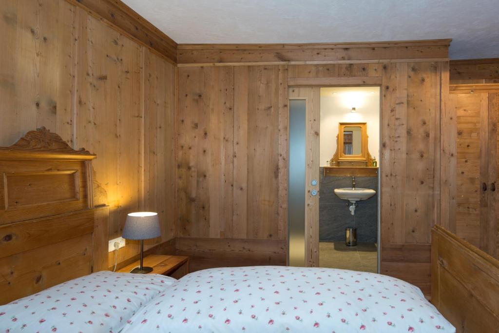 Postel nebo postele na pokoji v ubytování Garni Bachlerhof