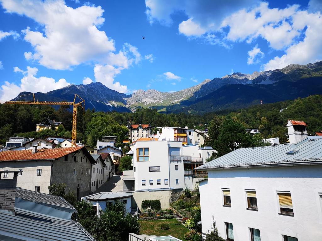 a view of a town with mountains in the background at Sankt-Nikolaus Studio Innsbruck in Innsbruck