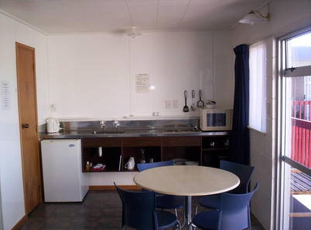 Kuchyň nebo kuchyňský kout v ubytování Broadway Motor Inn