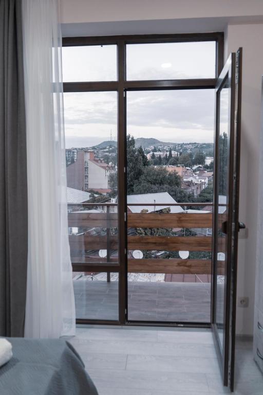 Balkón nebo terasa v ubytování Avlabari Terrace Rooms