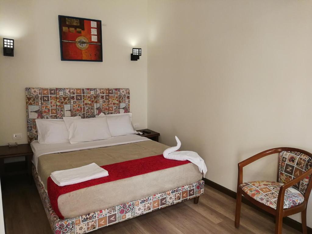 Postel nebo postele na pokoji v ubytování Cordoba Suites