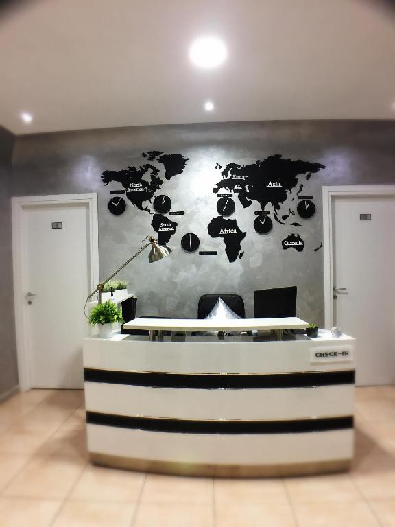 a room with a map of the world on a wall at Babyface in Rome
