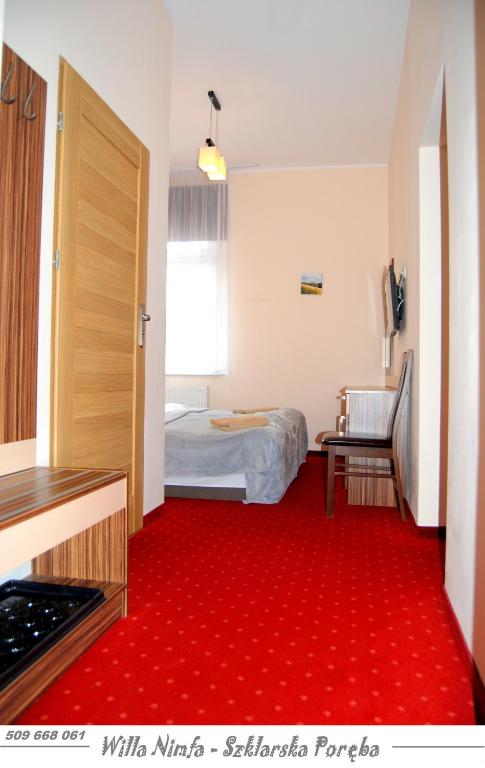 Posteľ alebo postele v izbe v ubytovaní Willa Nimfa pokoje i apartamenty, również cała willa na wyłączność